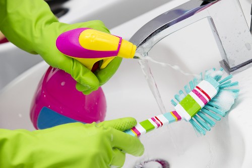 Professional cleaners working in a Paddington retail or customer-facing space